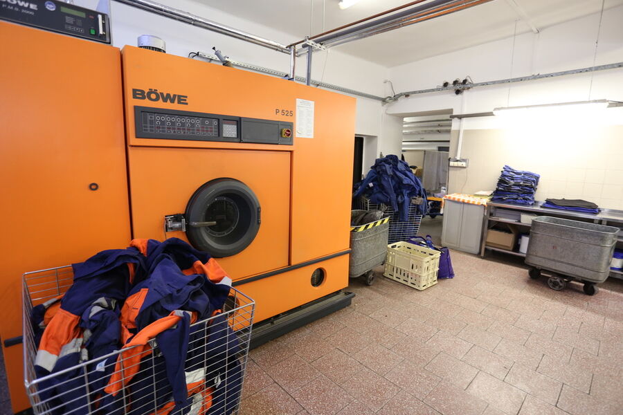 Pracovní oděvy připravené k čištění v naší prádelně
